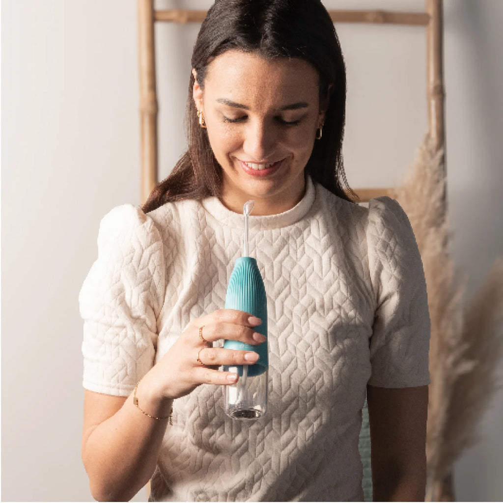 View of a Hydro-Go Water Flosser with tongue scraper attachement