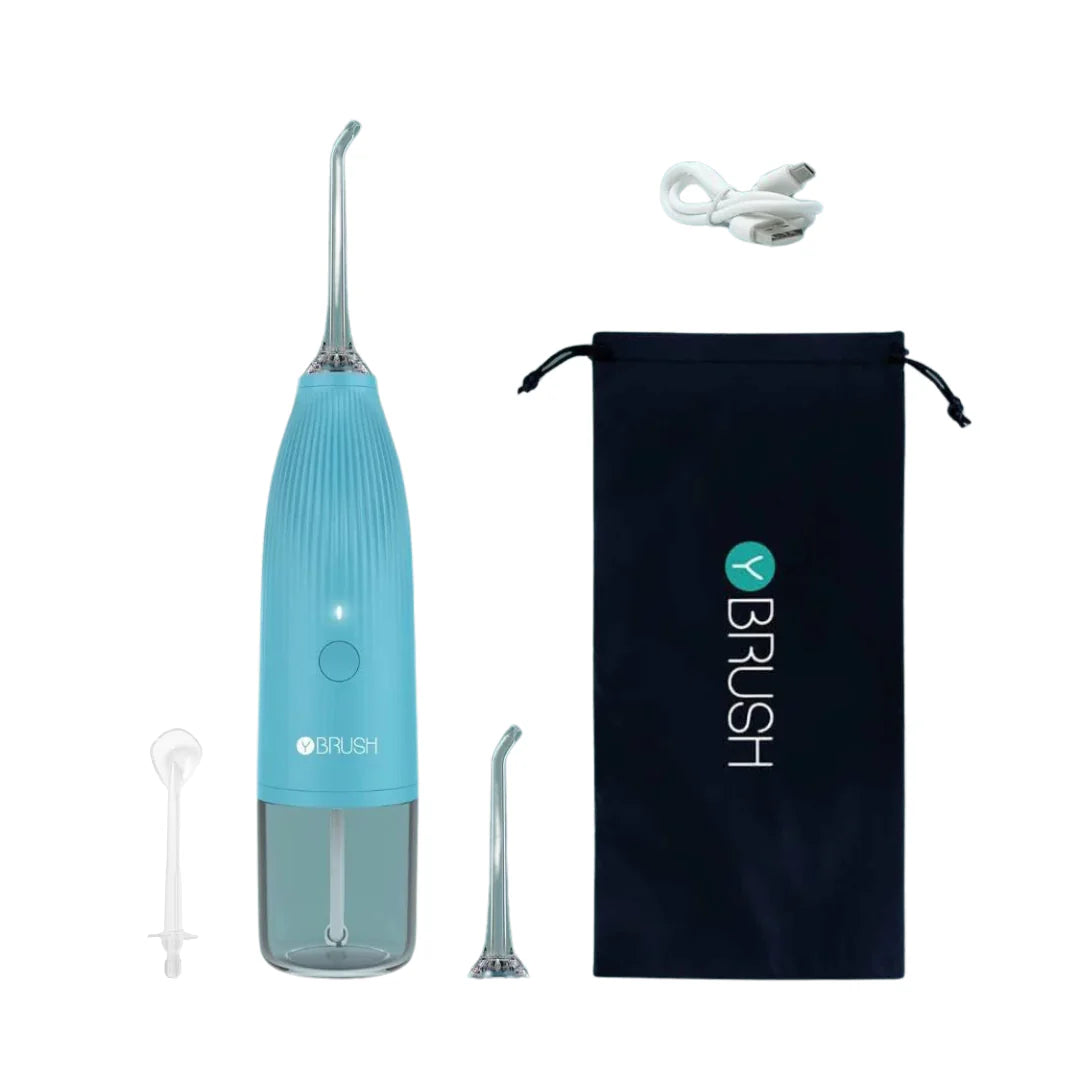 View of everything included with a Hydro-Go Water Flosser with tongue scraper attachement package